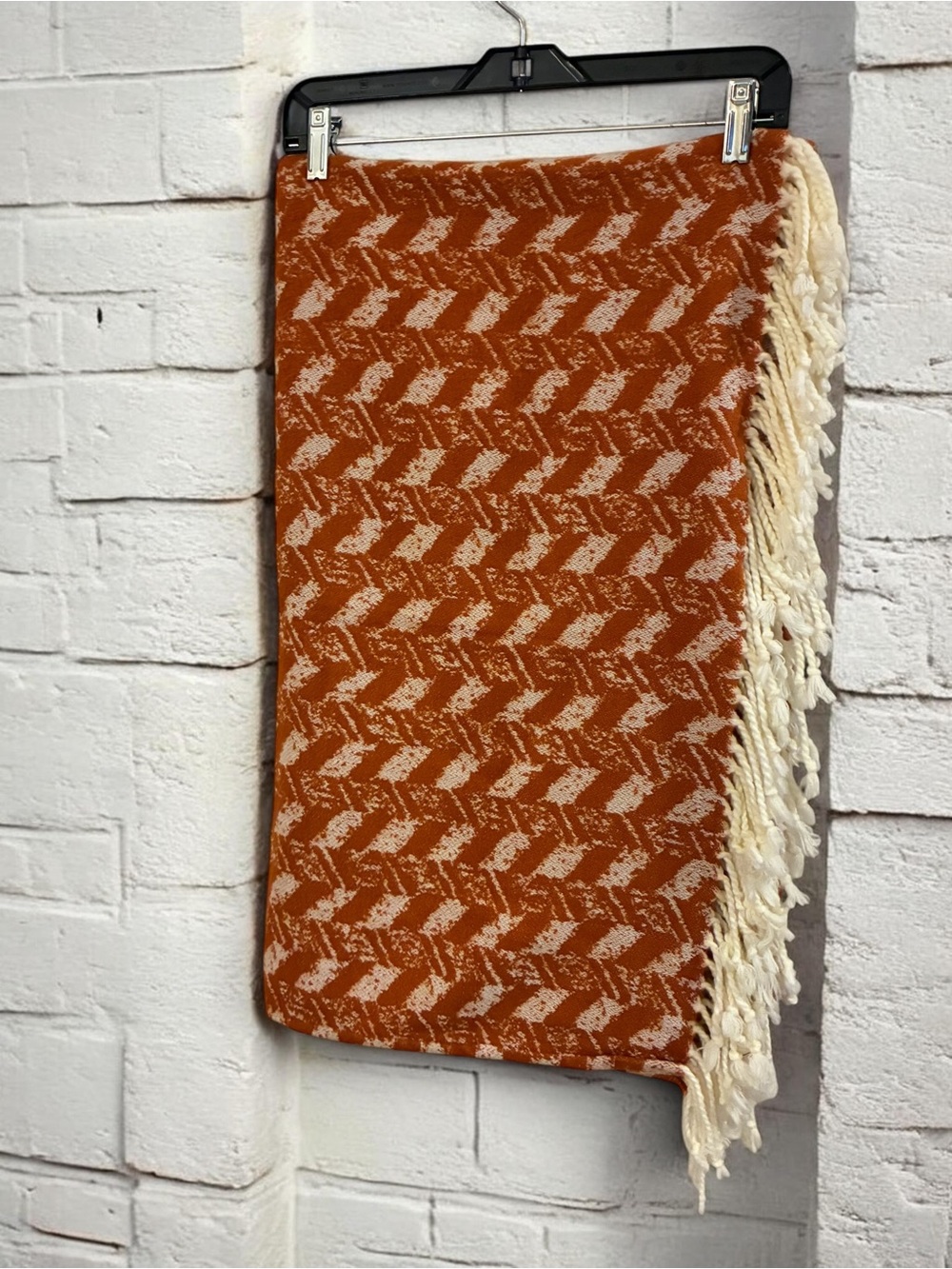 Threshold soft woven throw with knotted tassels. 60”x50”.